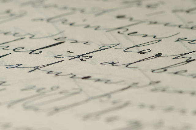 Close up college essay handwritten letter cursive ivy league