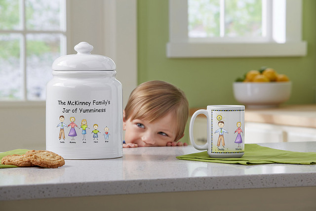 Personal Creations little kid peeking at personalized cookie jar and personalized mug on counter 