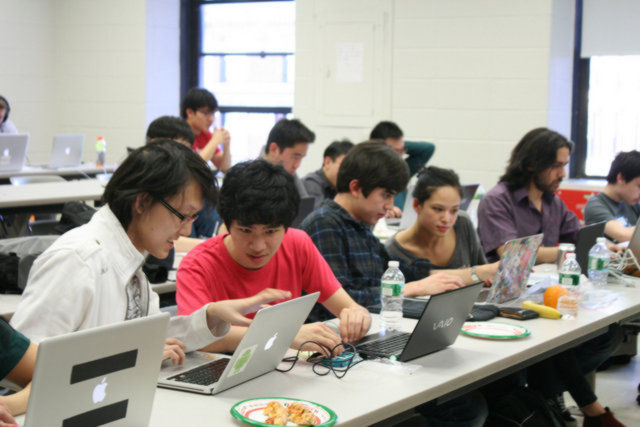 Students working together at Columbia university hackathon 2013 