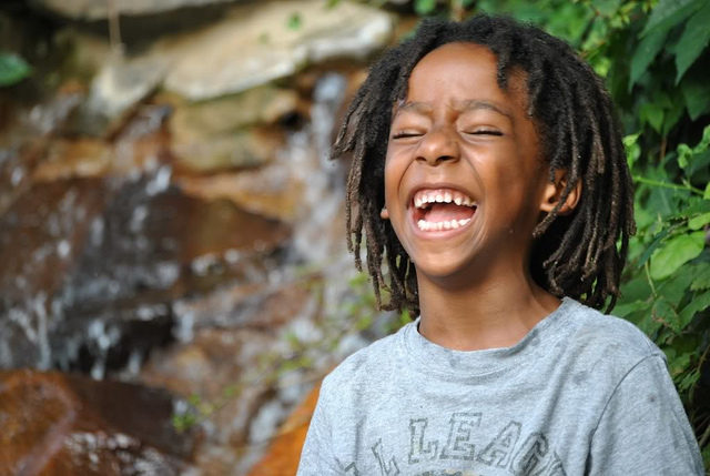 Young Boy Laughing Silly