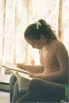Girl Studying in Book
