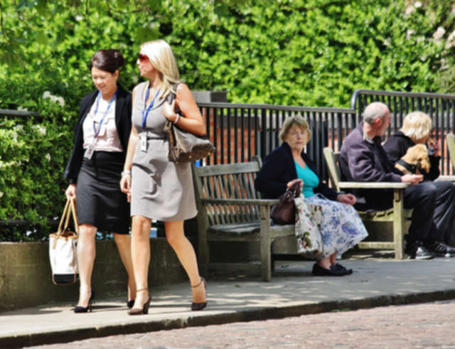 Two Female Sales Reps Dressed for Success 