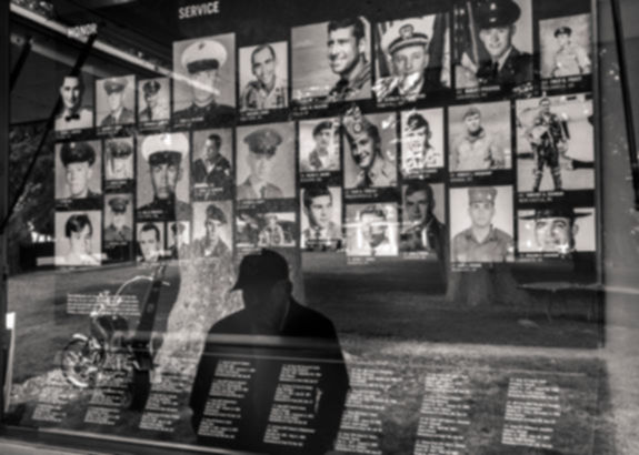 Elderly Veteran Viewing War Memorial