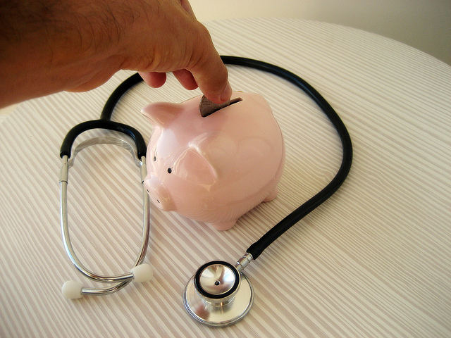 stethoscope and piggy bank medical school savings 