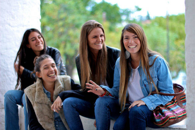 Female Friends laughing chatting girls 