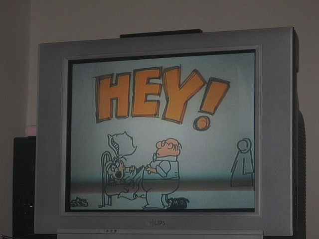The word Hey on a TV monitor