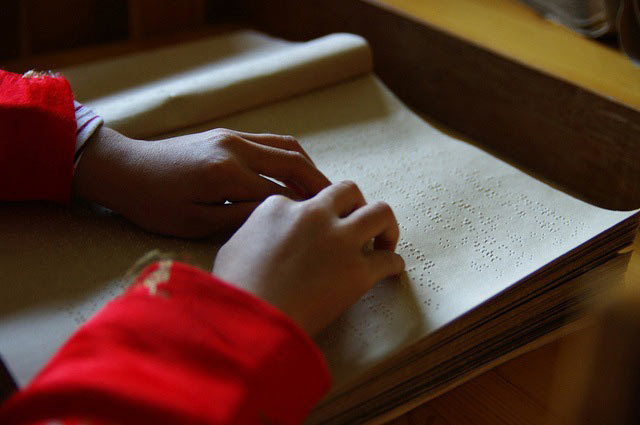 Learning another language by braille.