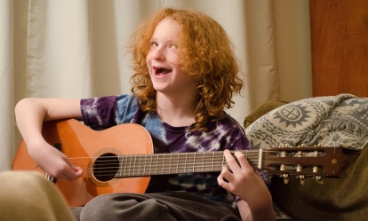 Kid Playing Guitar