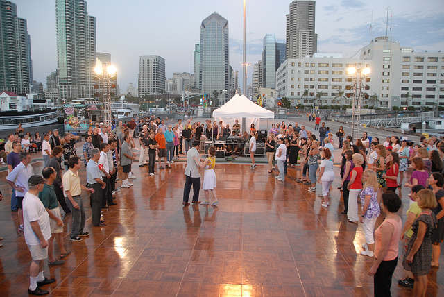 Couple Swing Dancing on Broadway