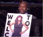 Shaq Holding Sign