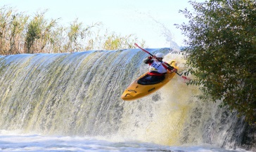 Kayaking Over Waterfall